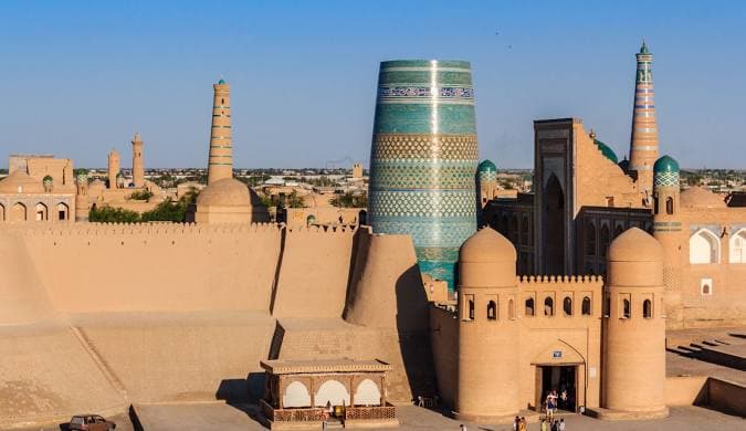 The ancient, sandy-colored walls of Itchan Kala in Khiva